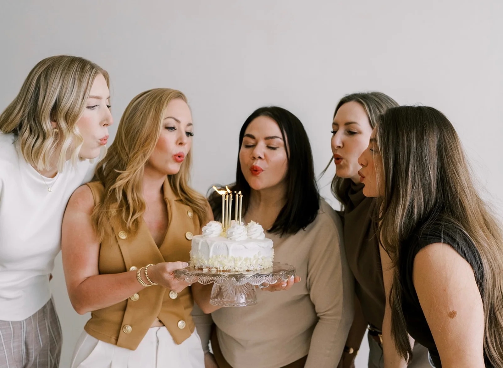 The NECTAR body•face•skin team celebrating five years in DeWitt MI