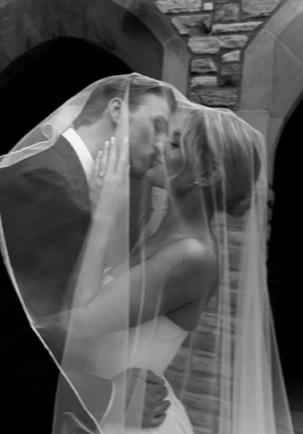 Mid-Michigan bride and groom under a veil, wedding-day skincare preparation at NECTAR body face skin